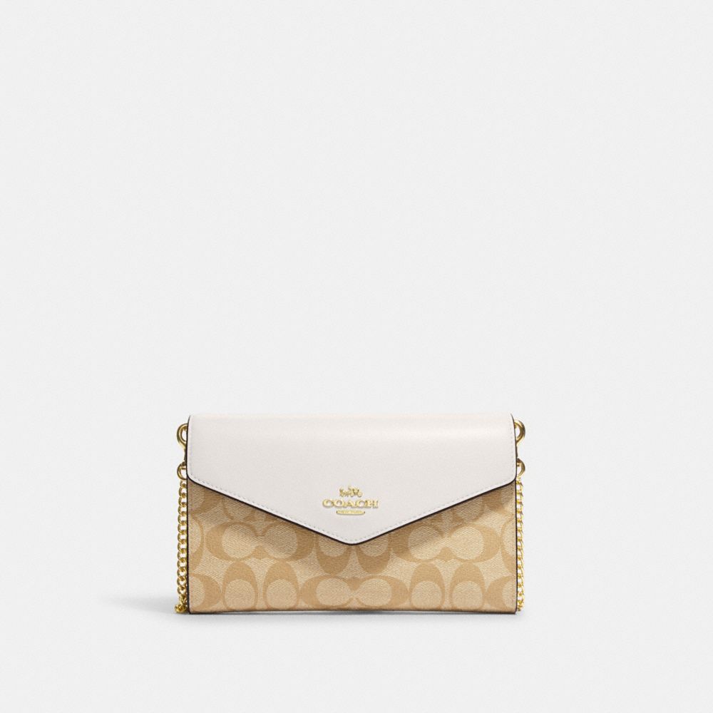 COACH®  Envelope Clutch Crossbody In Signature Canvas With Floral Applique