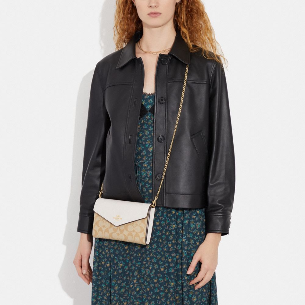 COACH®,Envelope Clutch Crossbody In Signature Canvas,,Detail View