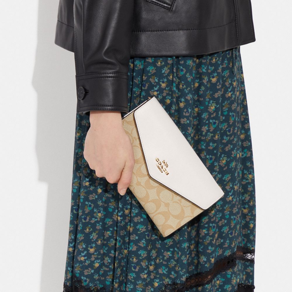 COACH®,Envelope Clutch Crossbody In Signature Canvas,,Detail View