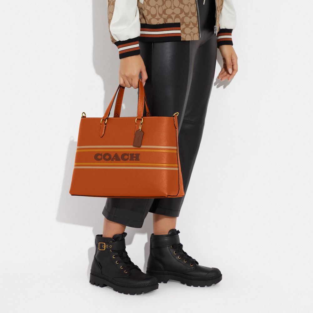 Coach Logan Carryall in Signature Canvas