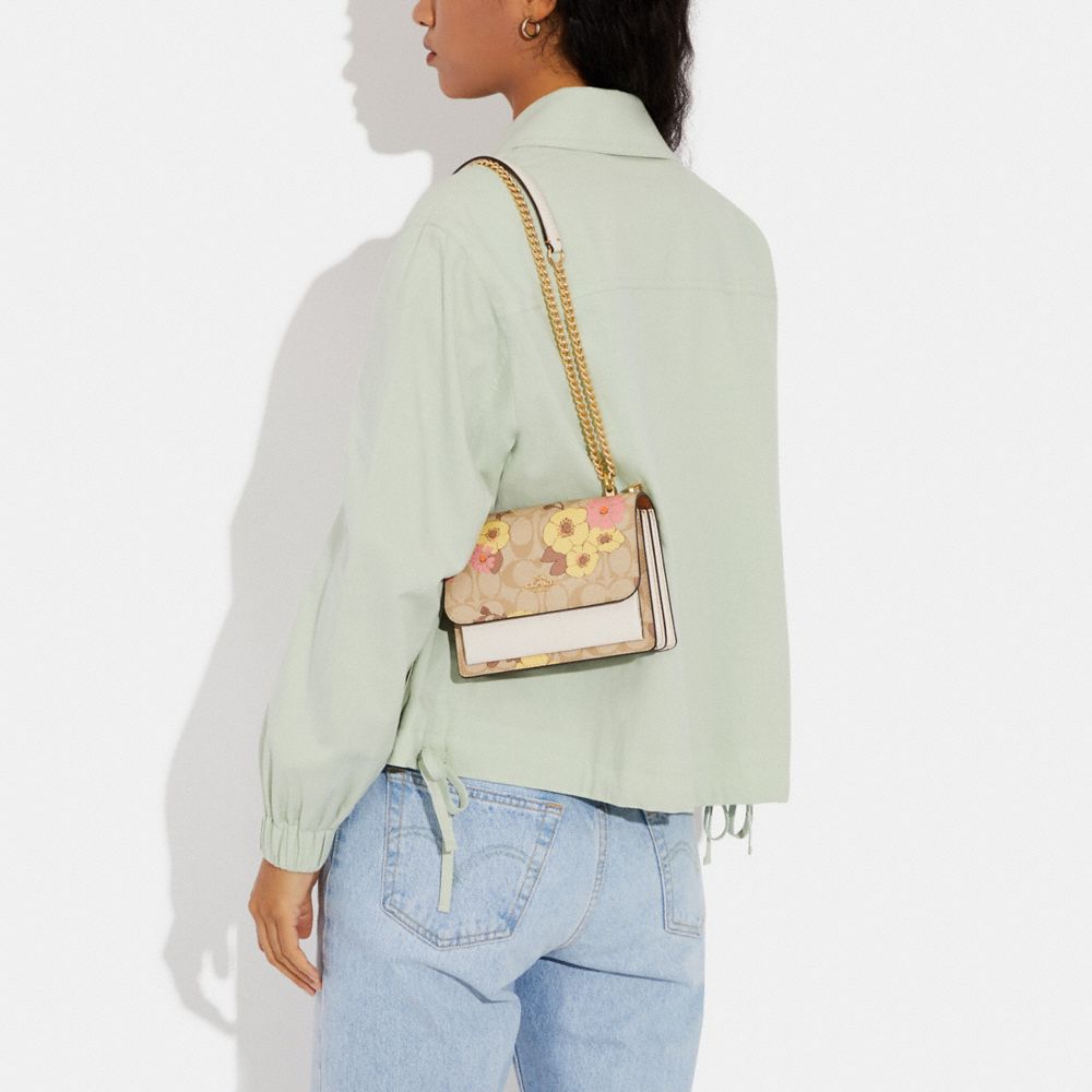 COACH®,Mini Klare Crossbody In Signature Canvas With Floral Cluster Print,,Detail View