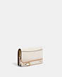 COACH®,ANNA FOLDOVER CLUTCH CROSSBODY,Leather,Mini,Gold/Chalk Multi,Angle View