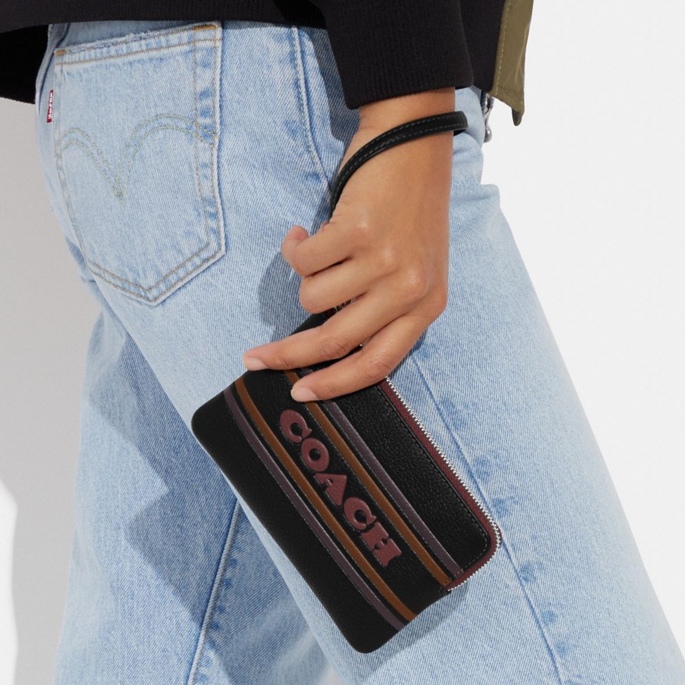 COACH®,Corner Zip Wristlet With Coach Stripe,,Detail View