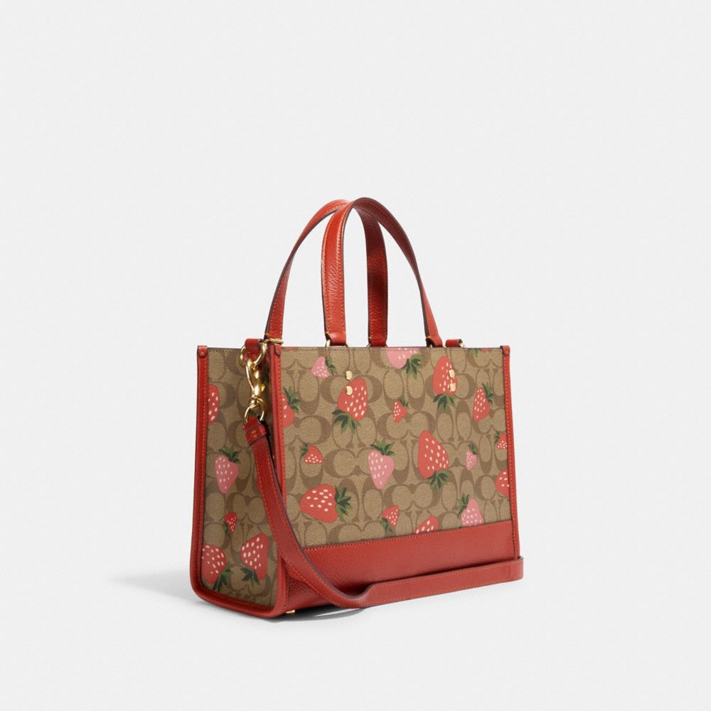 COACH® | Dempsey Carryall In Signature Canvas With Wild Strawberry