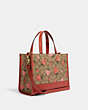 COACH®,DEMPSEY CARRYALL BAG IN SIGNATURE CANVAS WITH WILD STRAWBERRY PRINT,Medium,Gold/Khaki Multi,Angle View