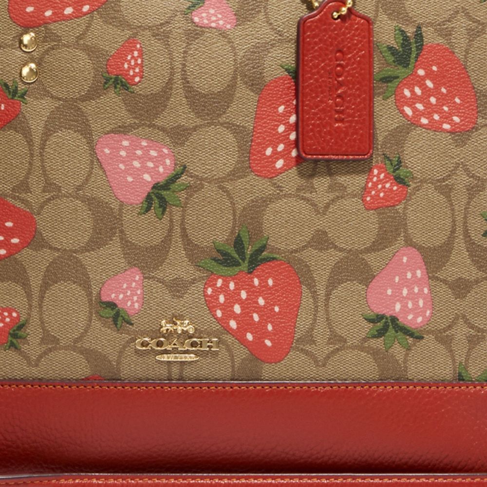 COACH®,Dempsey Carryall Bag In Signature Canvas With Wild Strawberry Print,,Detail View