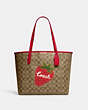 COACH®,CITY TOTE BAG IN SIGNATURE CANVAS WITH WILD STRAWBERRY,X-Large,Silver/Khaki/Electric Red,Front View