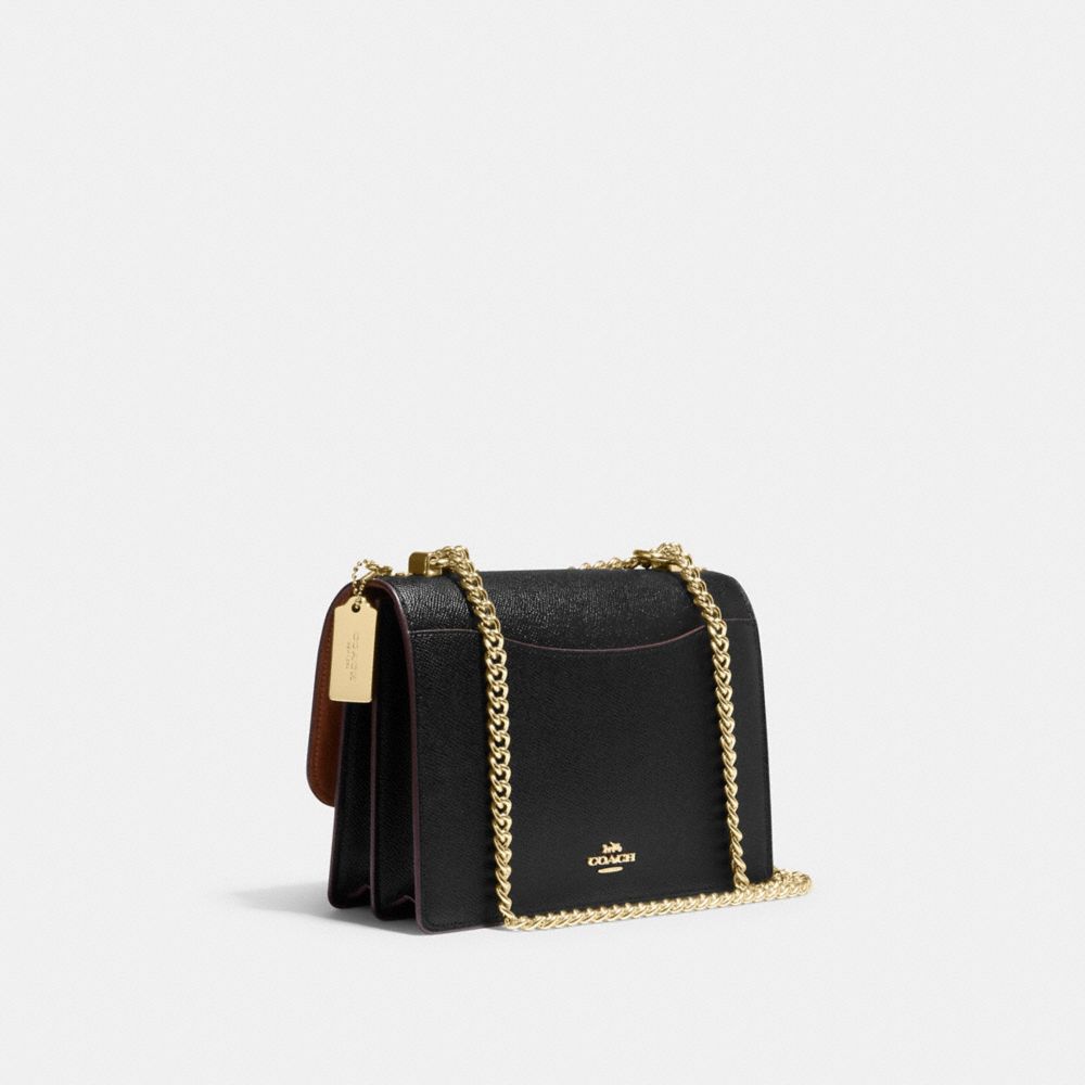 Coach signature sling online bag