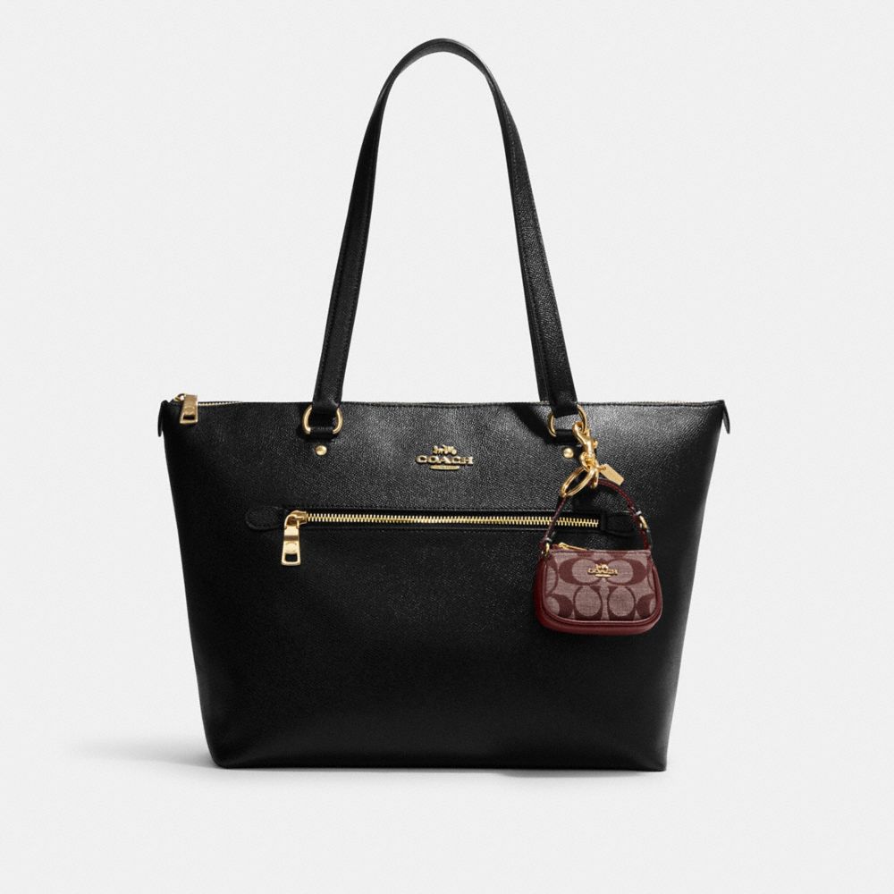 mini coach nolita tote charm｜TikTok Search