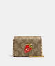 COACH®,MINI WALLET ON A CHAIN IN SIGNATURE CANVAS WITH STRAWBERRY,Leather,Mini,Im/Khaki/Electric Red,Front View