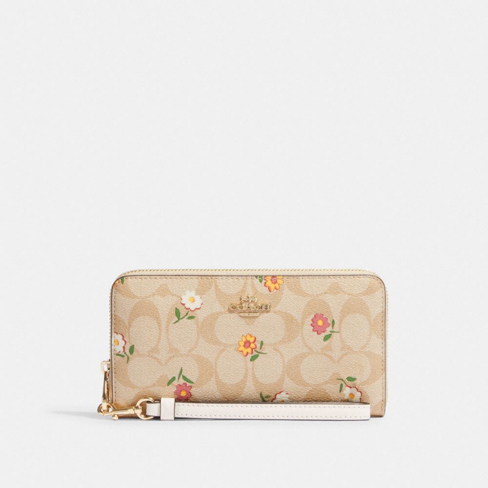 COACH®,LONG ZIP AROUND WALLET IN SIGNATURE CANVAS WITH NOSTALGIC DITSY PRINT,Mini,Gold/Light Khaki Multi,Front View