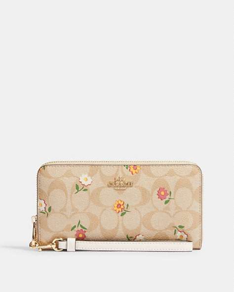 COACH®,LONG ZIP AROUND WALLET IN SIGNATURE CANVAS WITH NOSTALGIC DITSY PRINT,Mini,Gold/Light Khaki Multi,Front View