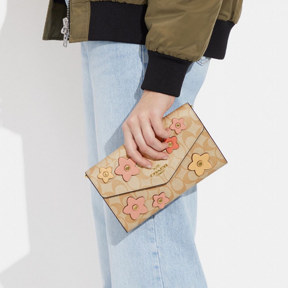 COACH®  Envelope Clutch Crossbody In Signature Canvas With Floral