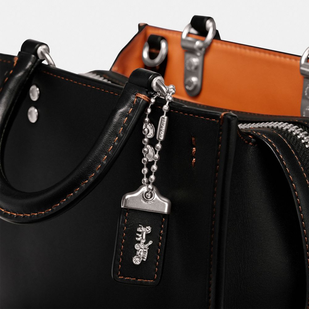 Coach black nappa leather rogue 31 with quilting and rivets