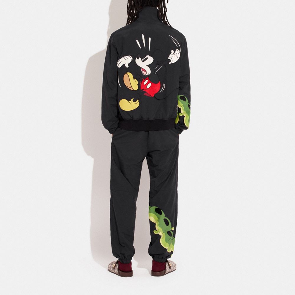 COACH®  Disney X Coach Track Pants