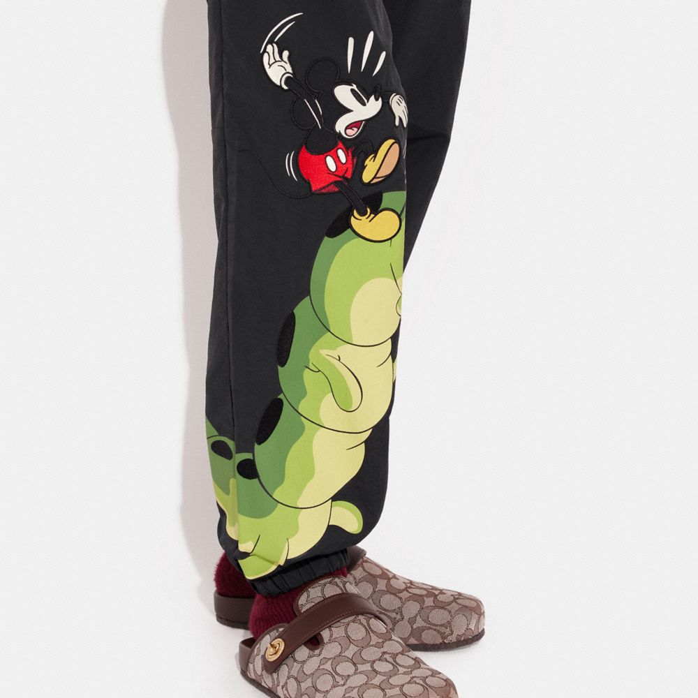 COACH®  Disney X Coach Track Pants