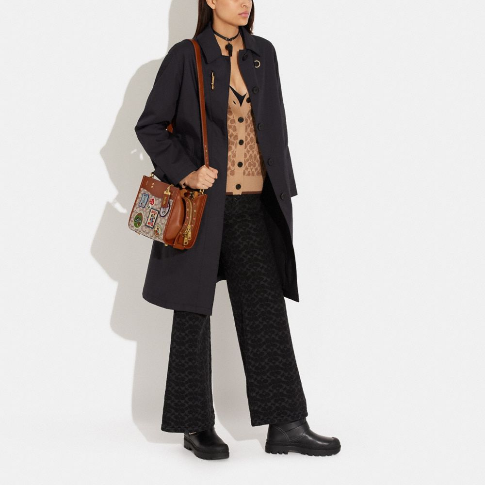 Disney X Coach Rogue Bag 25 In Signature Textile Jacquard With Patches