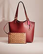 COACH®,RESTORED DAY TOTE,Polished Pebble Leather,Large,Brass/Brick Red,Angle View