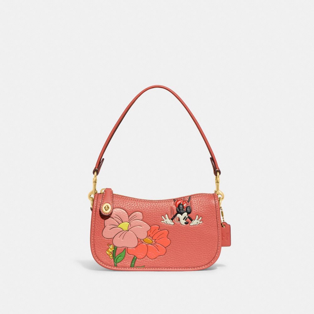 COACH®,DISNEY X COACH SWINGER BAG 20 IN REGENERATIVE LEATHER WITH MICKEY MOUSE AND FLOWERS,Glovetanned Leather,S...,Brass/Burnt Coral,Front View