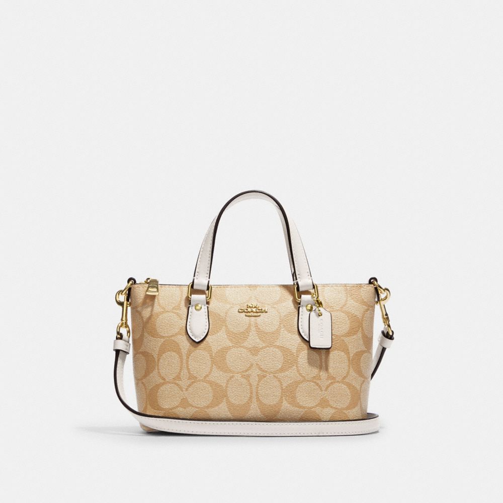 COACH Patchwork Tan Gold Brown Leather Pochette Purse - clothing &  accessories - by owner - apparel sale - craigslist