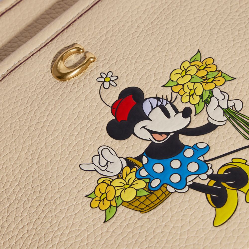 COACH®,DISNEY X COACH KITT MESSENGER CROSSBODY IN REGENERATIVE LEATHER WITH MINNIE MOUSE,Smooth Leather,Mini,Brass/Ivory,Closer View