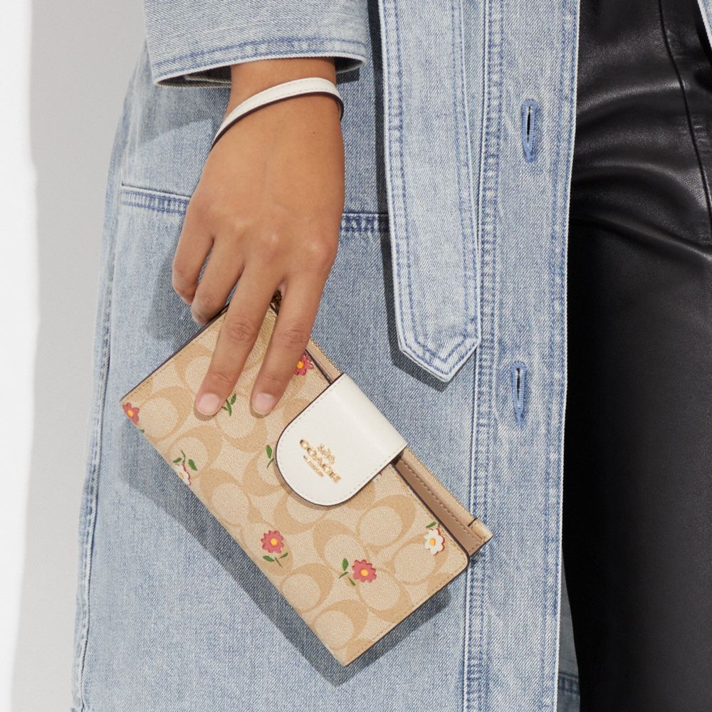 COACH OUTLET®  Tech Wallet In Signature Canvas With Wildflower Print