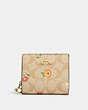 COACH®,SNAP WALLET IN SIGNATURE CANVAS WITH NOSTALGIC DITSY PRINT,Mini,Gold/Light Khaki Multi,Front View