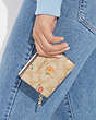 COACH®,SNAP WALLET IN SIGNATURE CANVAS WITH NOSTALGIC DITSY PRINT,Mini,Gold/Light Khaki Multi,Detail View