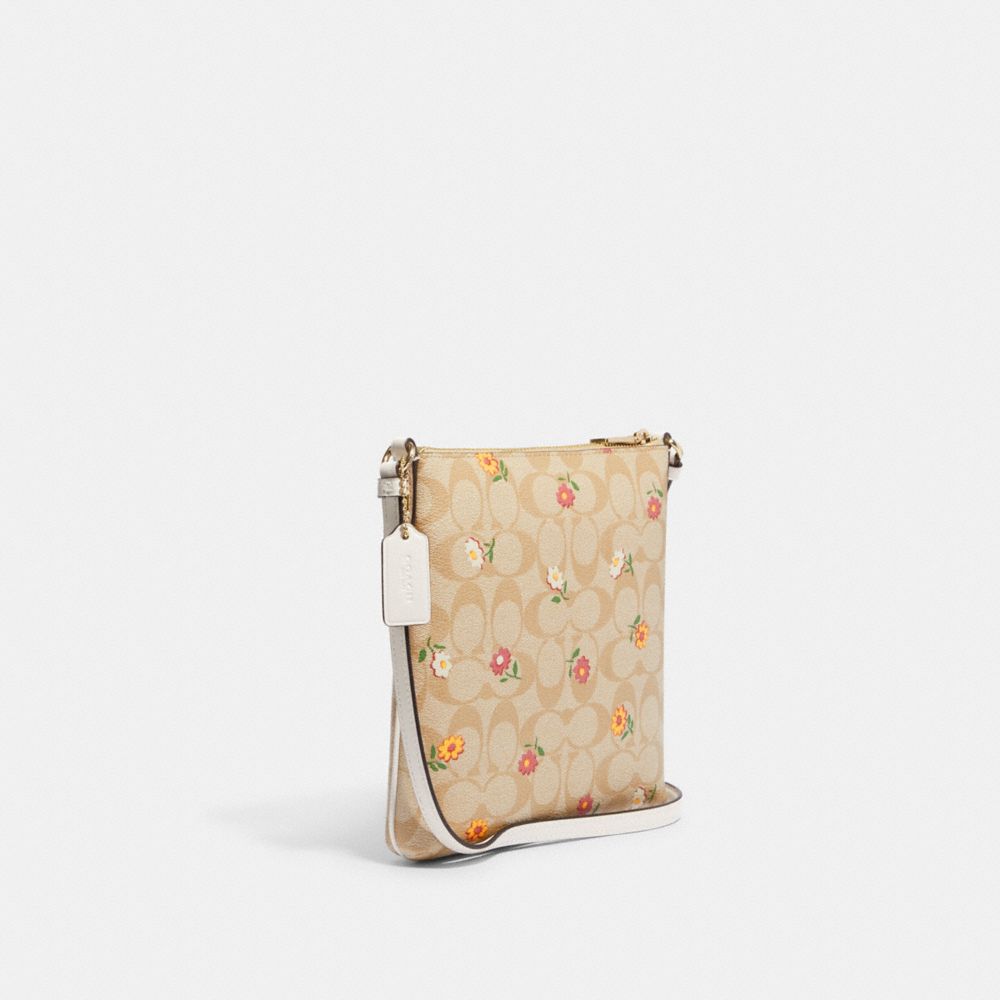 COACH®,MINI ROWAN FILE BAG IN SIGNATURE CANVAS WITH NOSTALGIC DITSY PRINT,Signature Canvas,Gold/Light Khaki Multi,Angle View