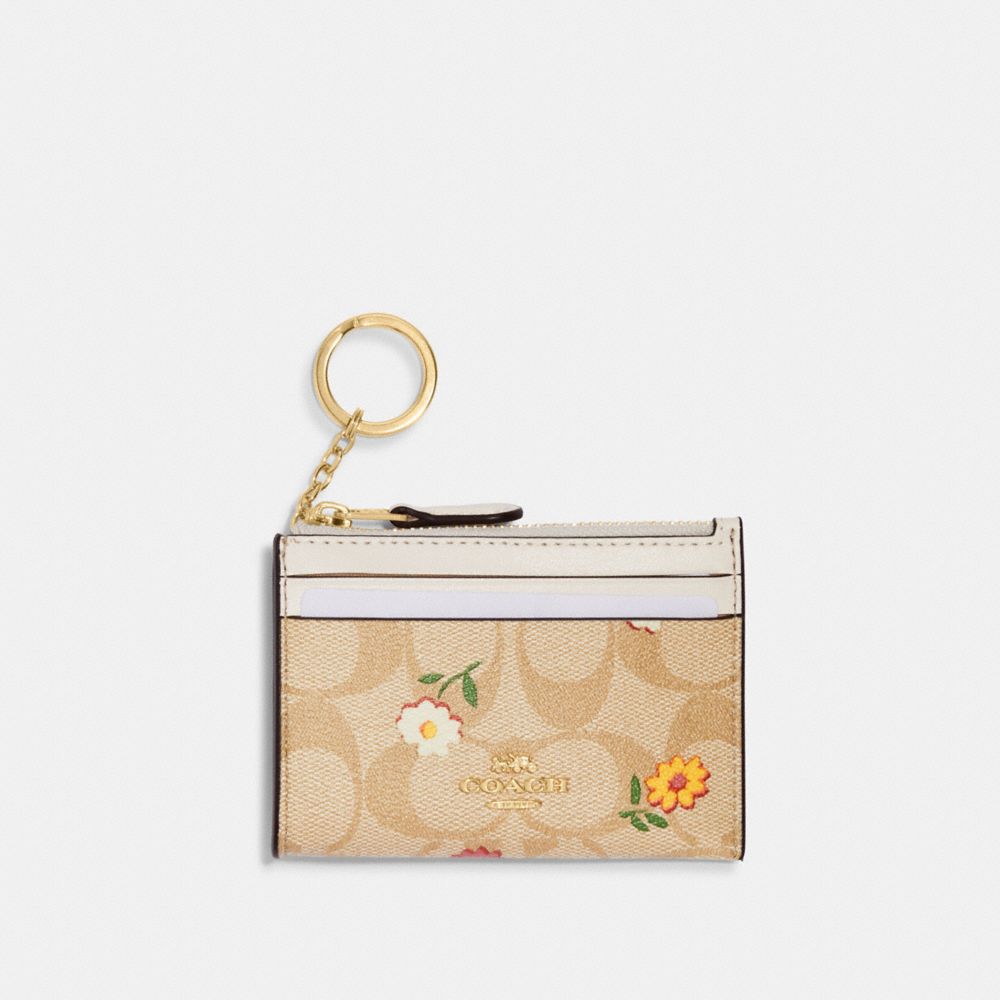 Coach X Peanuts Mini Skinny Id Case Small Wallet With Woodstock PrintC4594  Brown Size One Size - $63 (36% Off Retail) - From Emily