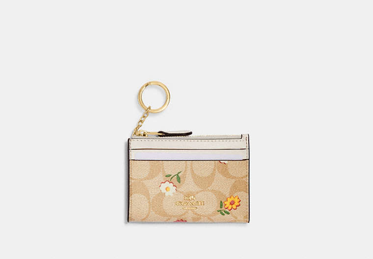 COACH®,MINI SKINNY ID CASE IN SIGNATURE CANVAS WITH NOSTALGIC DITSY PRINT,Gold/Light Khaki Multi,Front View