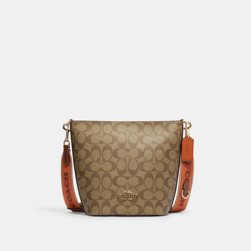 Coach Mini Abby Duffle Crossbody/Shoulder Bag in Signature PVC Leather :  : Clothing & Accessories