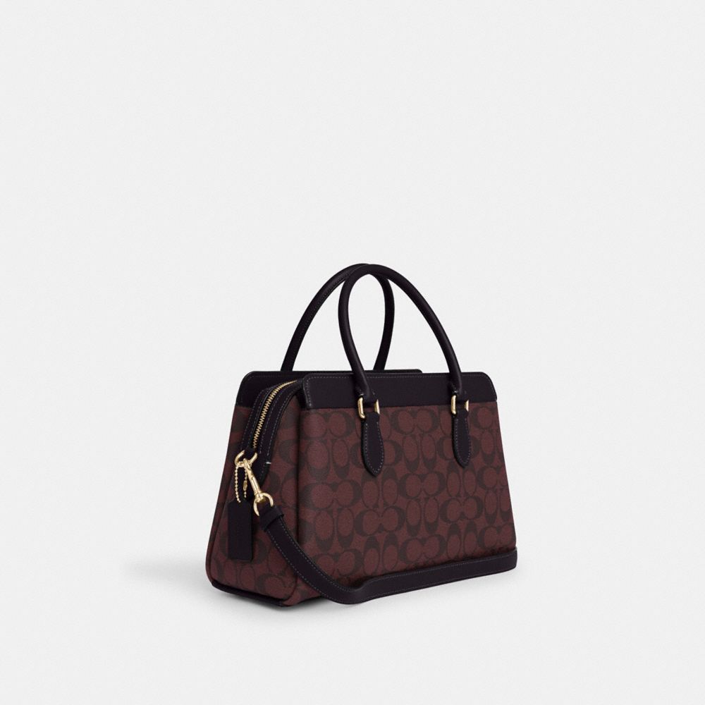 COACH®,DARCIE CARRYALL BAG IN SIGNATURE CANVAS,Medium,Anniversary,Gold/Oxblood Multi,Angle View