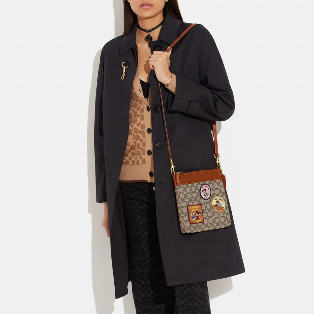 COACH®  Disney X Coach Nolita 19 In Signature Jacquard With Mickey Mouse  Print