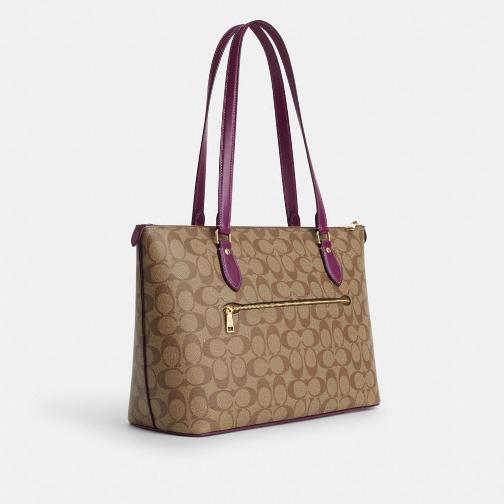 COACH®,GALLERY TOTE BAG IN SIGNATURE CANVAS,Signature Canvas,Everyday,Gold/Khaki/Deep Berry,Angle View