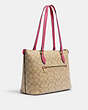 COACH®,GALLERY TOTE BAG IN SIGNATURE CANVAS,pvc,Large,Everyday,Im/Light Khaki/Petunia,Angle View
