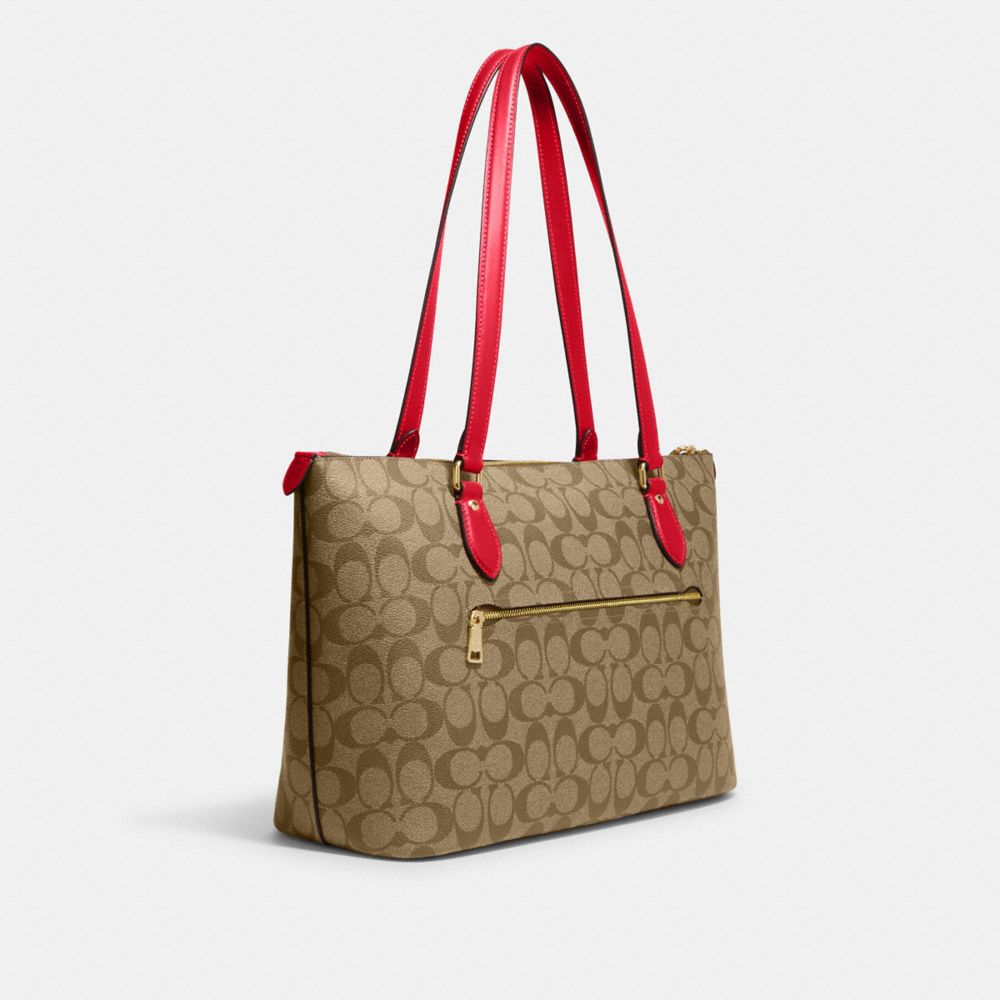 COACH®,GALLERY TOTE BAG IN SIGNATURE CANVAS,Signature Canvas,Everyday,Im/Khaki/Electric Red,Angle View