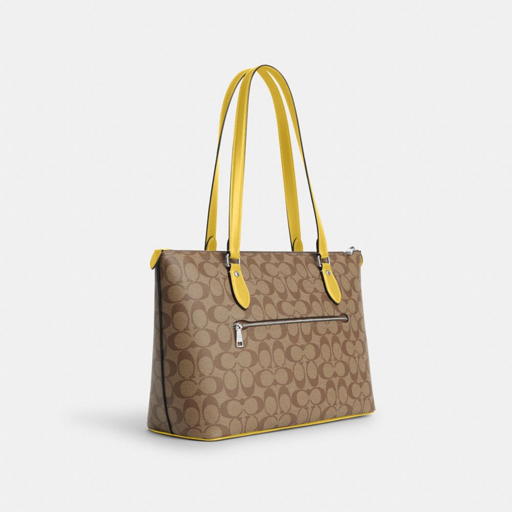 COACH®,GALLERY TOTE BAG IN SIGNATURE CANVAS,Signature Canvas,Everyday,Silver/Khaki/Retro Yellow,Angle View