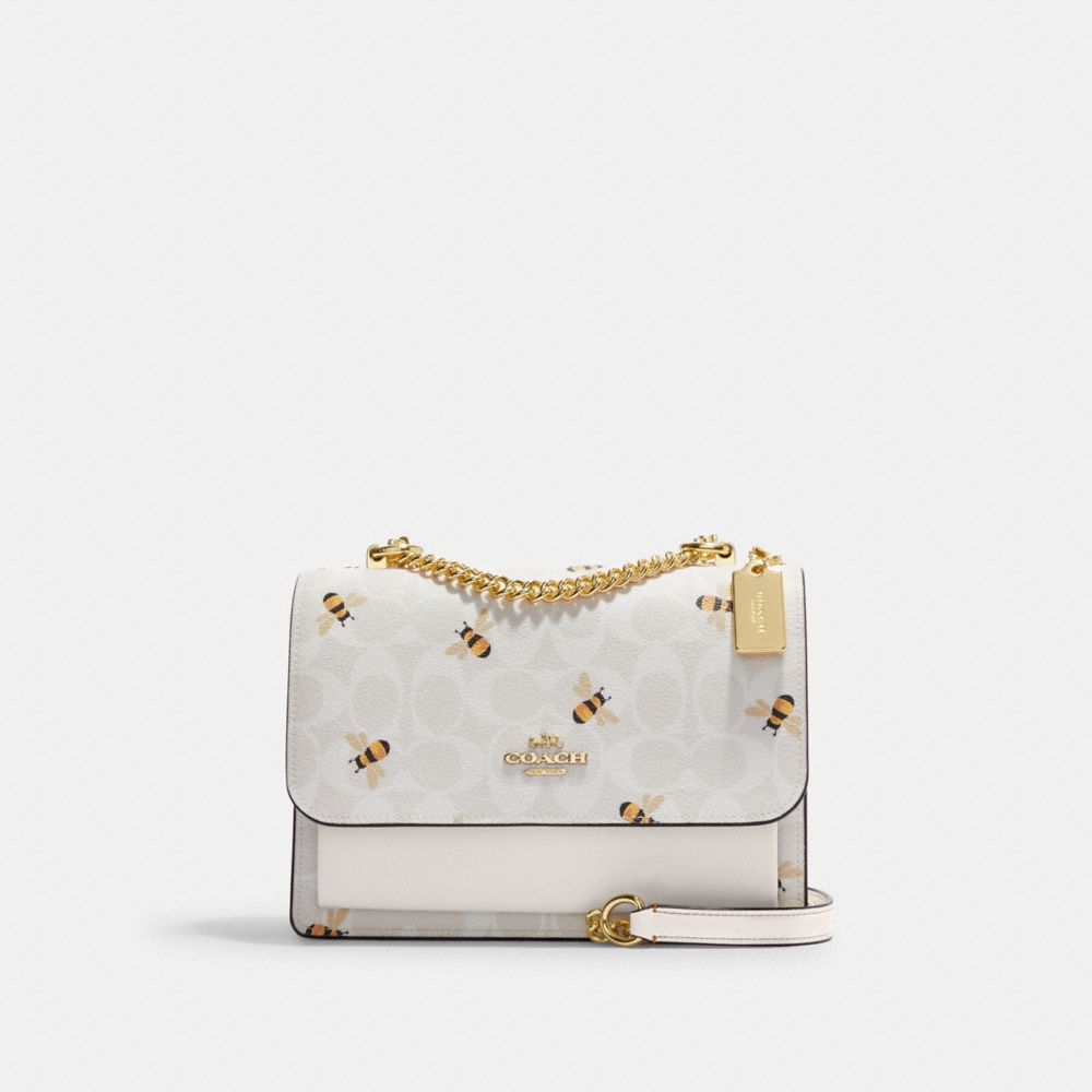 Gold Chalk Glacier White Multi Klare Crossbody Bag In Signature Canvas With Bee Print