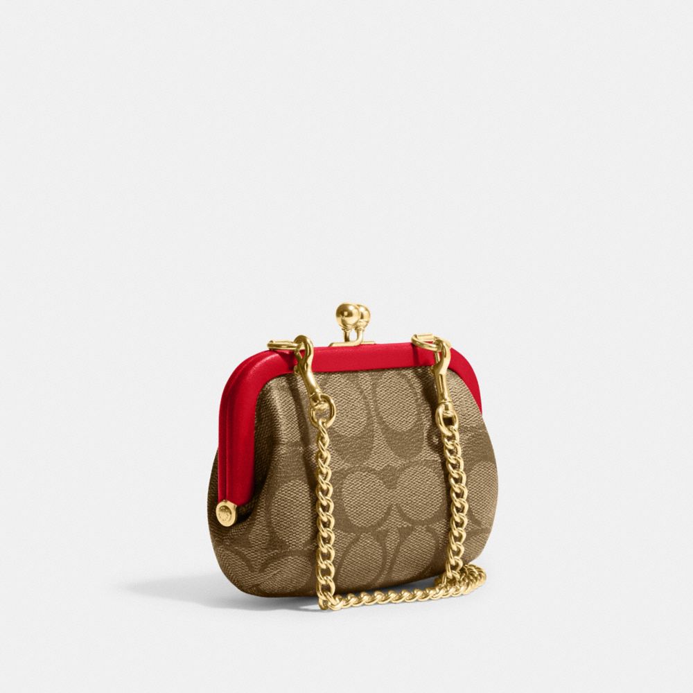 COACH® | Nora Kisslock Card Case In Signature Canvas