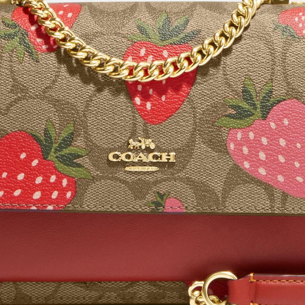 Coach Gold / Red Signature Canvas Mini Klare Strawberry Print Crossbody Bag