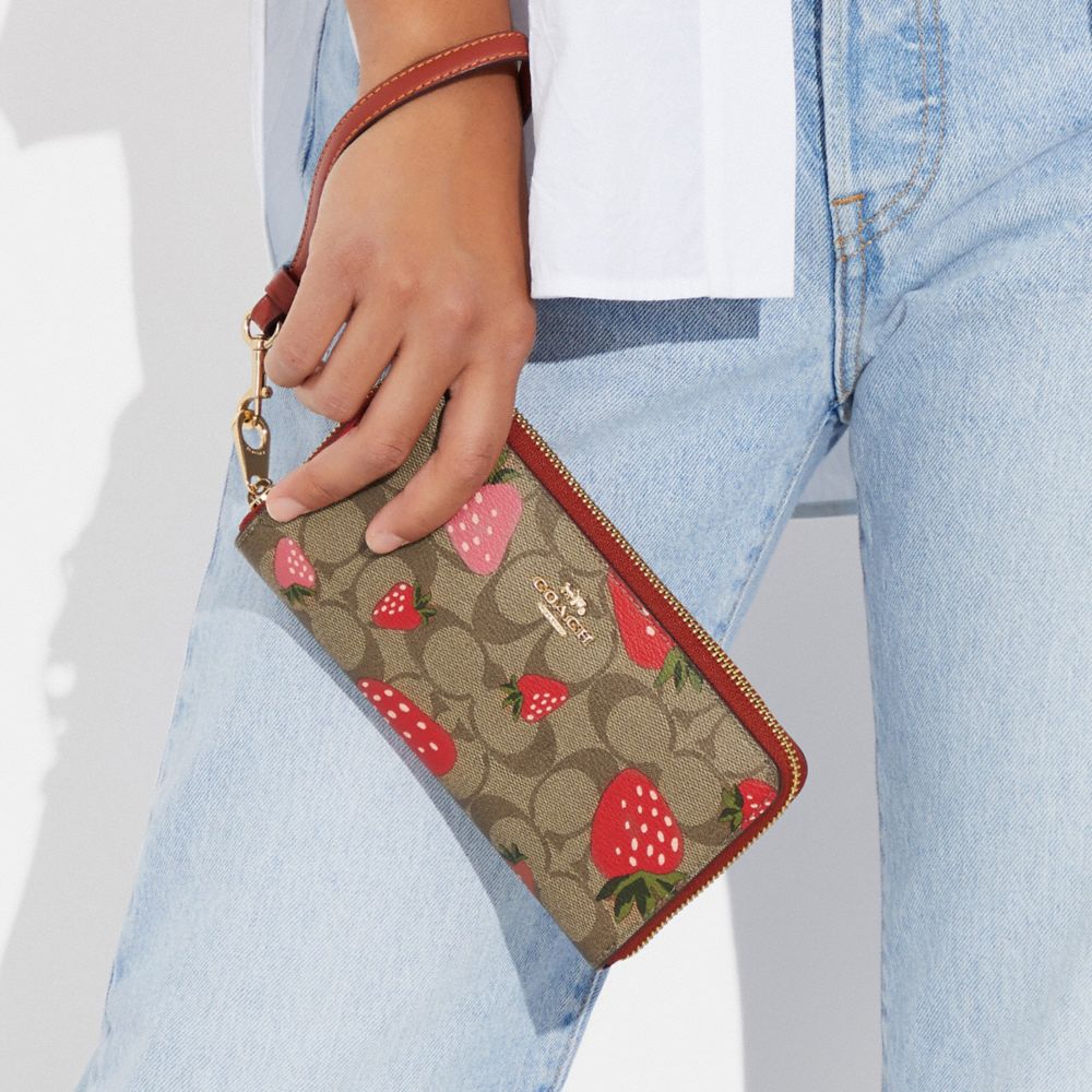 COACH® | Long Zip Around Wallet In Signature Canvas With Wild