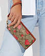 COACH®,LONG ZIP AROUND WALLET IN SIGNATURE CANVAS WITH WILD STRAWBERRY PRINT,Mini,Gold/Khaki Multi,Detail View