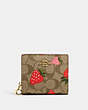 COACH®,SNAP WALLET IN SIGNATURE CANVAS WITH WILD STRAWBERRY PRINT,Mini,Gold/Khaki Multi,Front View