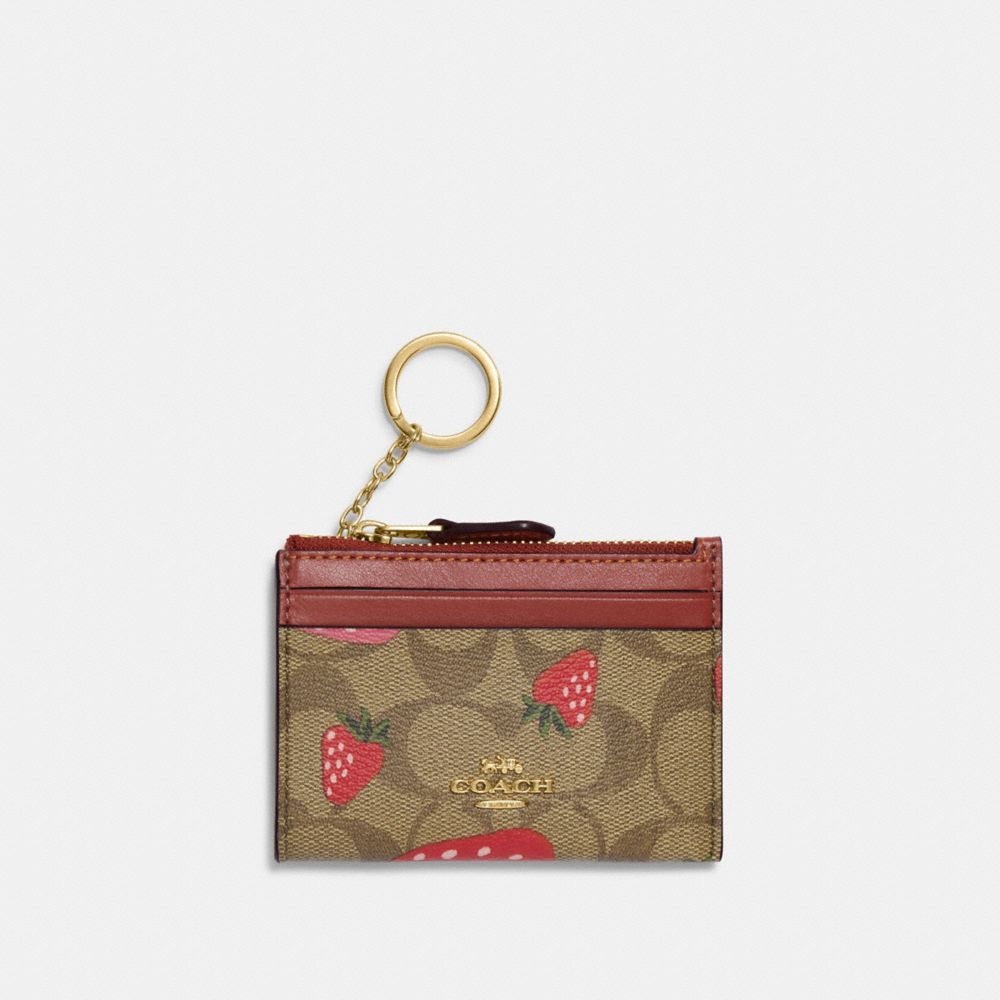 COACH® | Mini Skinny Id Case In Signature Canvas With Wild 