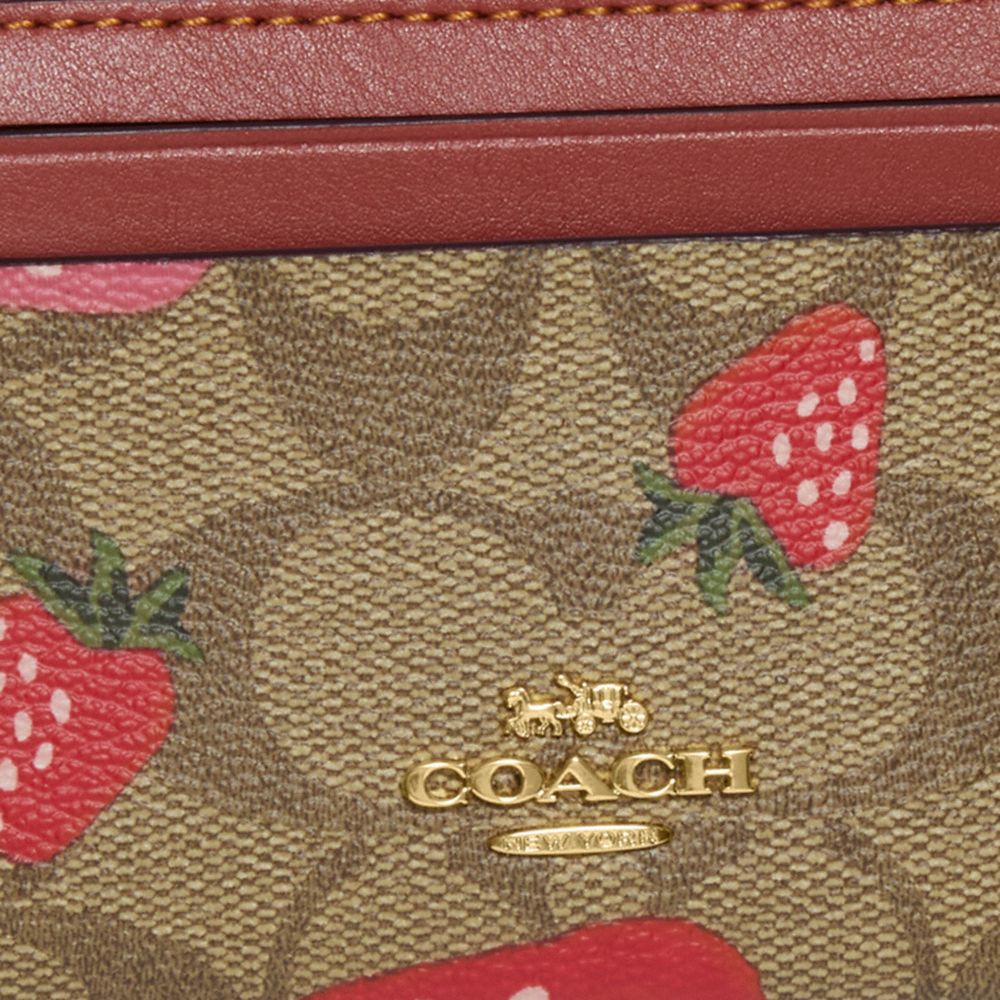 COACH® | Mini Skinny Id Case In Signature Canvas With Wild 