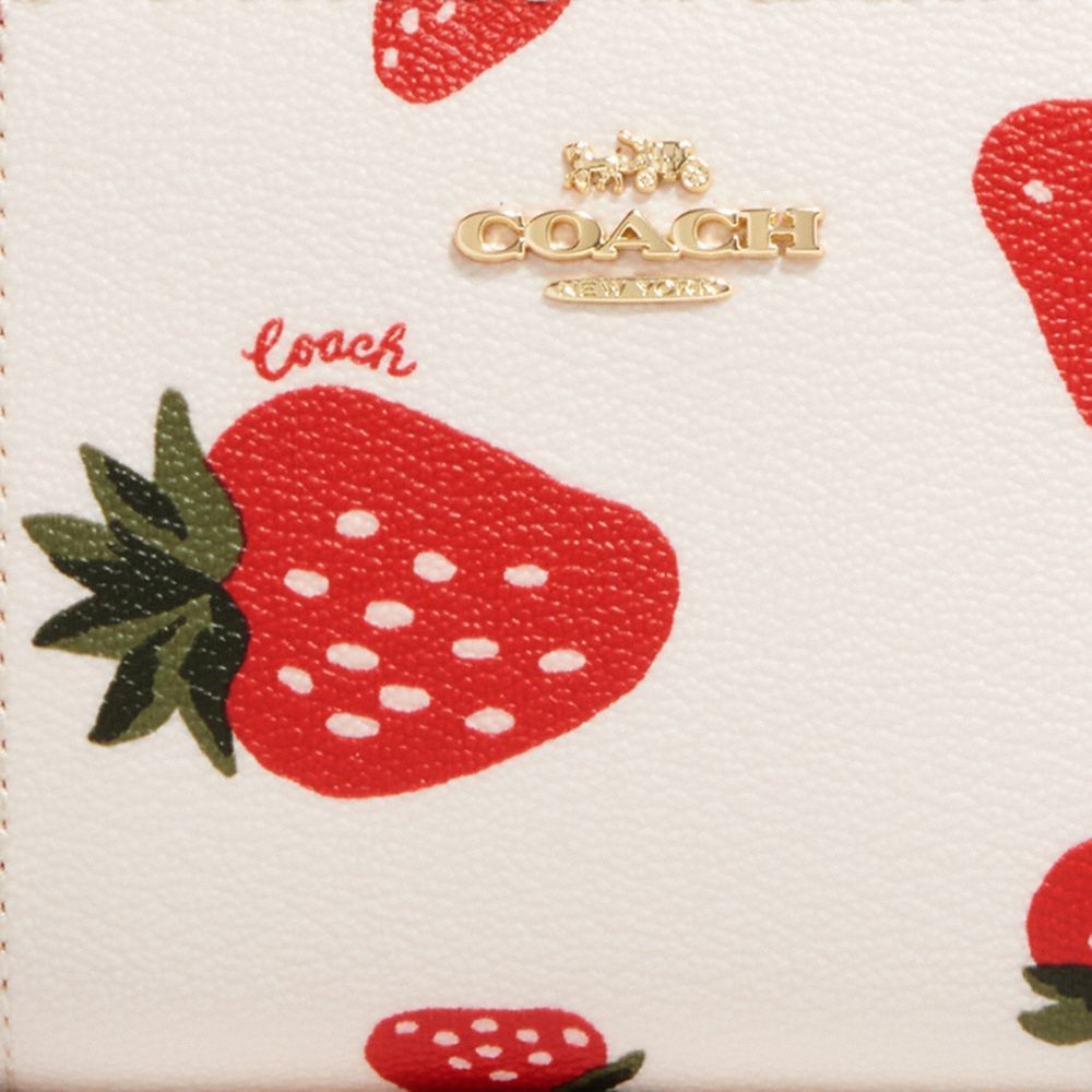 COACH®  Snap Wallet In Signature Canvas With Strawberry Print