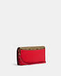Anna Foldover Clutch Crossbody In Signature Canvas With Strawberry