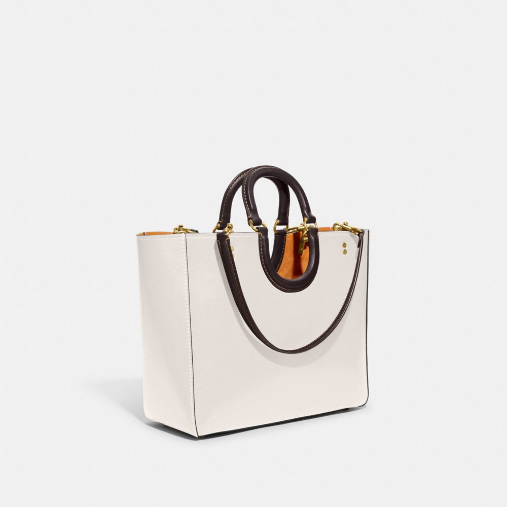 COACH®,RAE TOTE BAG IN COLORBLOCK,Glovetan Leather,X-Large,Brass/Chalk Multi,Angle View