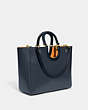 COACH®,RAE TOTE BAG IN COLORBLOCK,Glovetanned Leather,X-Large,Brass/Dark Denim Multi,Angle View